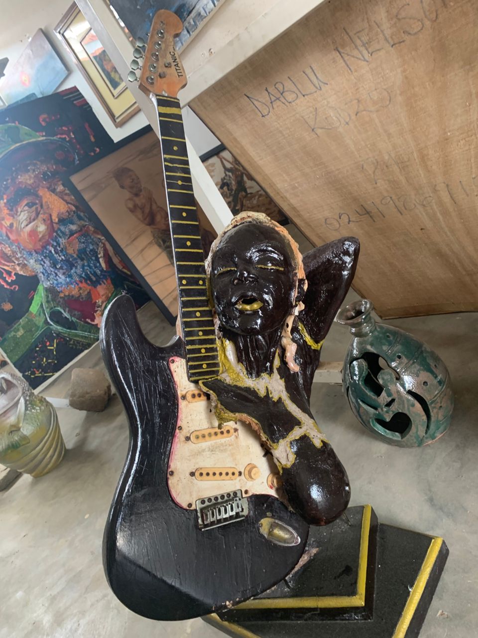 GUITAR SCULPTURE WITH MASK